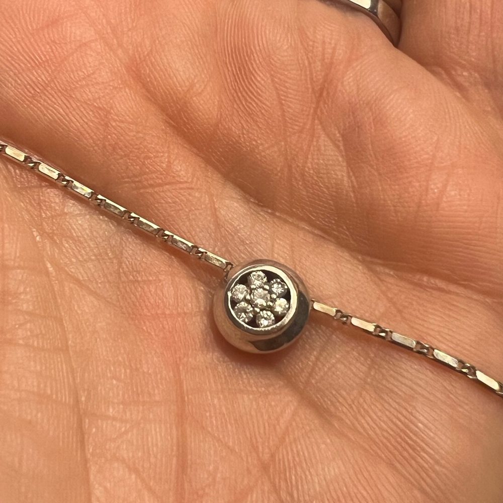 14 carat white gold genuine diamonds pendant.